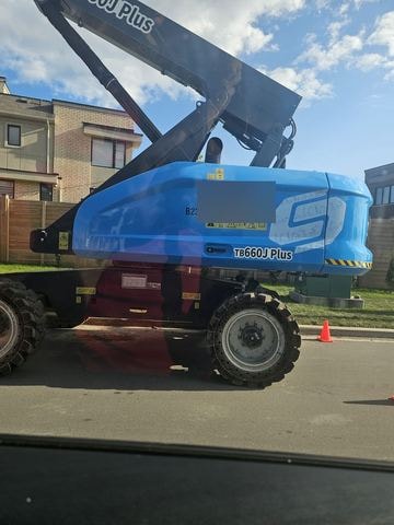 Boom lift tire service on a job site
