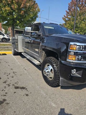 Heavy-duty pickup with new tires installed on-site