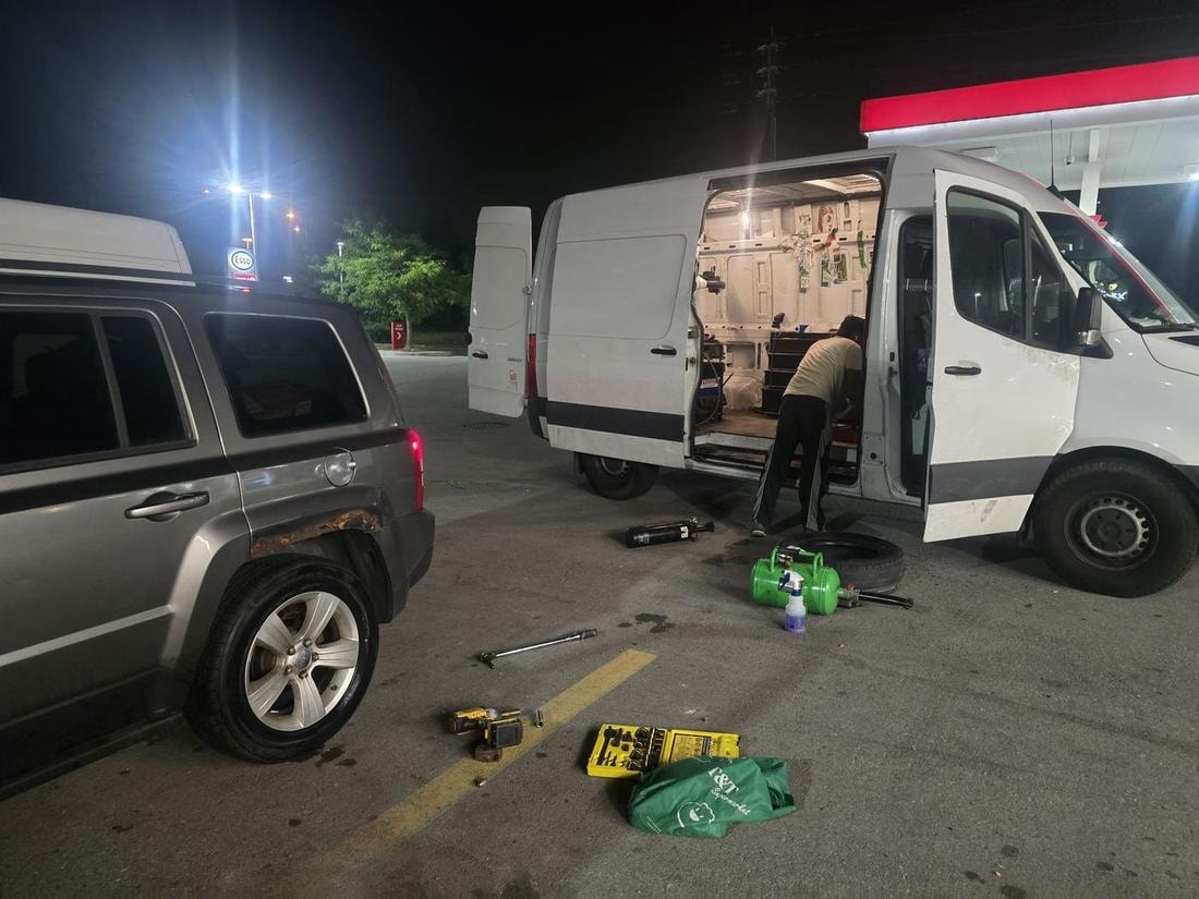 Mobile tire service van working at night in the GTA