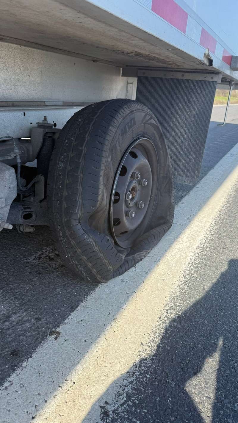 Worn commercial truck tire removed for on-site roadside replacement in the GTA